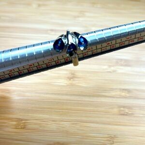 Swatch ring. Stainless steel and blue glass.